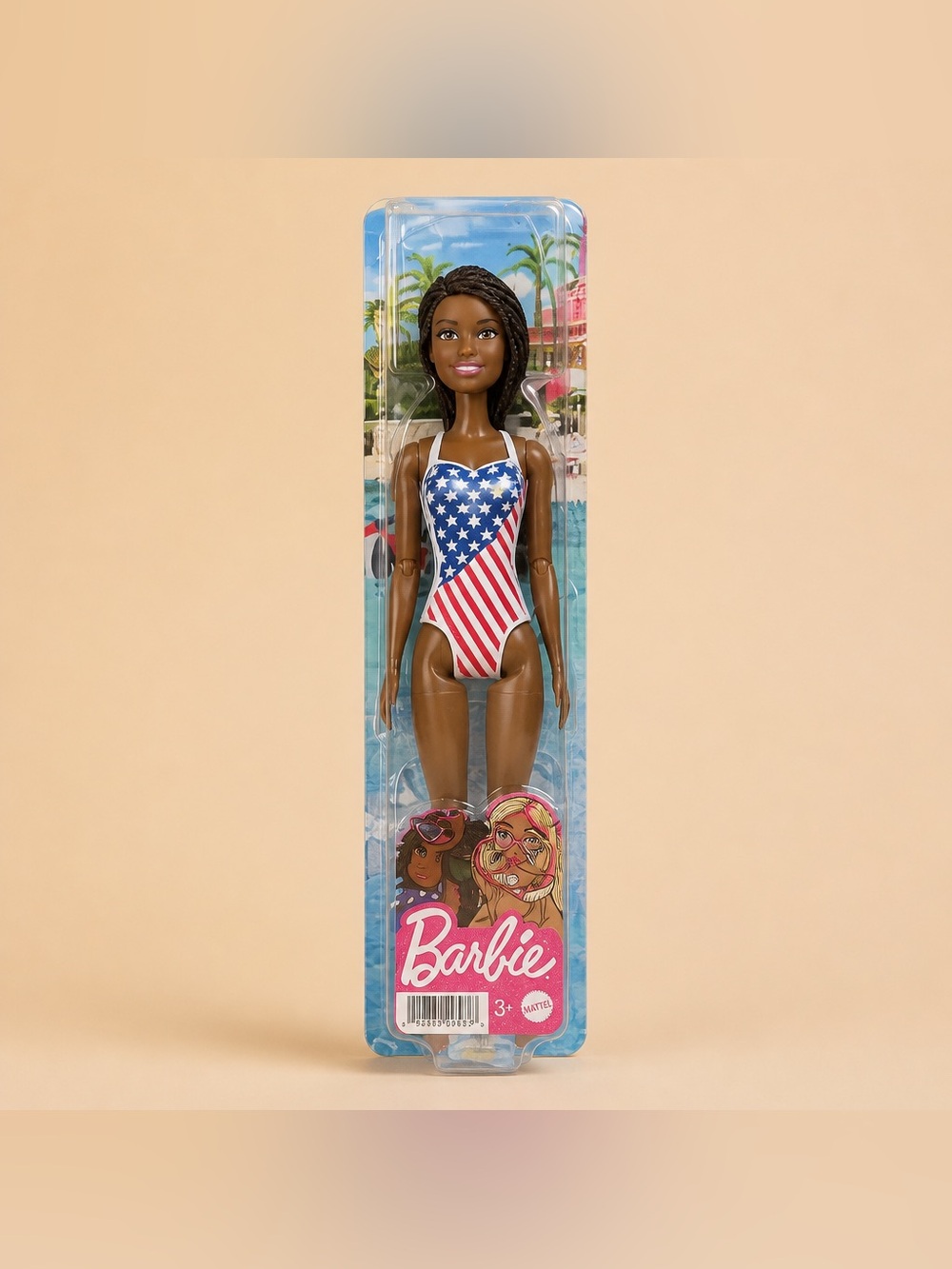 Mattel Barbie Doll with Beach Theme in an American Flag Swimsuit.